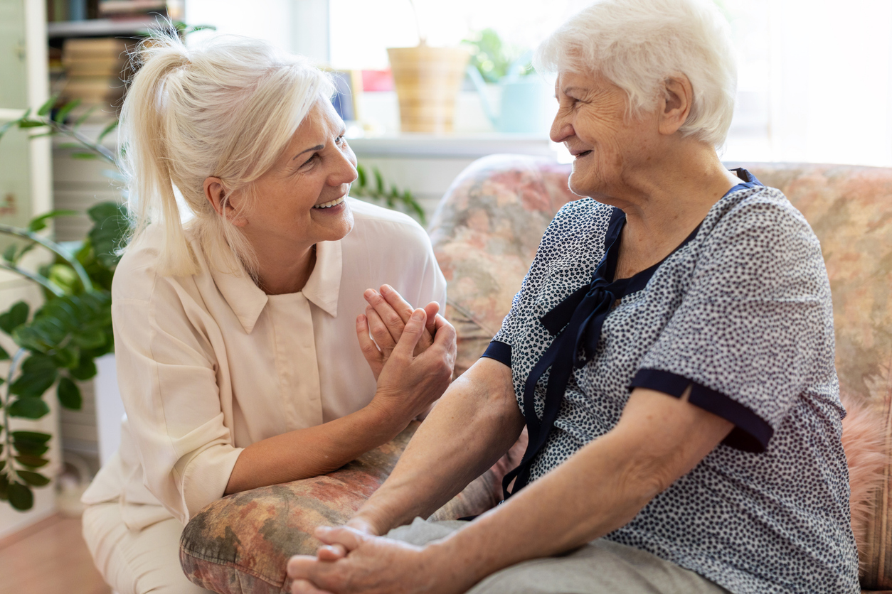 Woman spending time with her elderly mother